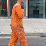 Electical Engineer Lad Wearing Portwest Bizflame Orange Boilersuit 17 Engineer lad replacing street paving that was removed to install a new electricity supply